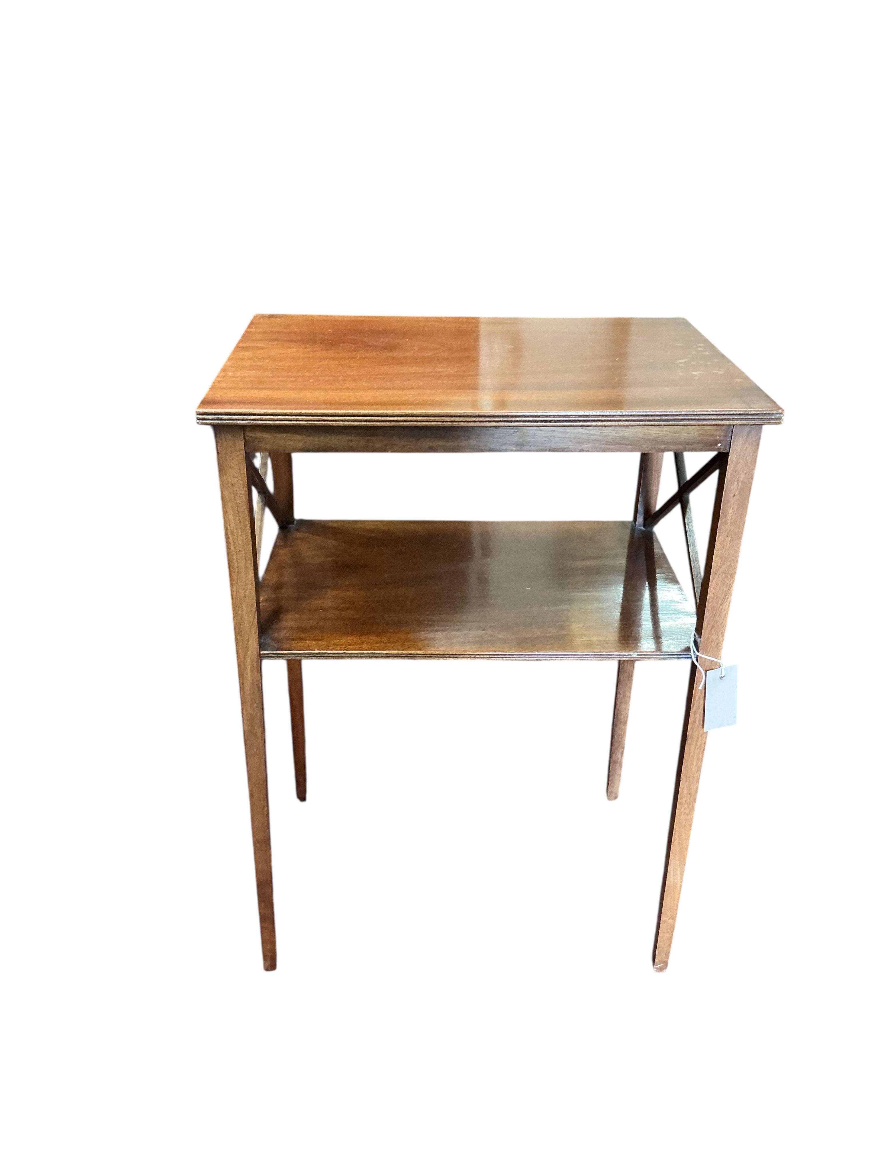 A pair of Edwardian rectangular mahogany two tier occasional tables, width 49cm, depth 35cm, height 69cm